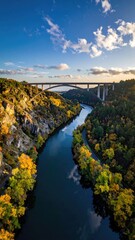 Bridge over river in autumn scenery
