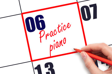 6 th day of the month.  Hand writing Practice piano reminder and drawing red frame on calendar with...