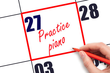 27 th day of the month.  Hand writing Practice piano reminder and drawing red frame on calendar...