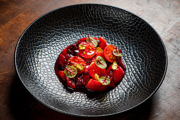 Fresh tomatoes and herbs make a stunning dish, beautifully presented in a unique bowl