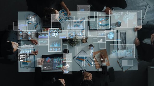 A top-down view of a business meeting where a diverse team collaborates on data analysis, utilizing graphs and technology to drive decisions and strategies. Raster - Powered by Adobe