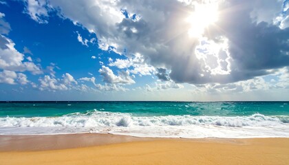 Fototapeta premium A sunlit view of a beautiful beach with turquoise waves crashing on golden sand under a cloudy, blue sky
