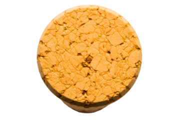 Close-up top view of a natural cork wine bottle stopper on a transparent background