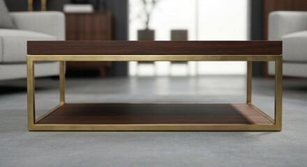 Fototapeta premium Close-up of a stylish rectangular dark wood and gold frame coffee table