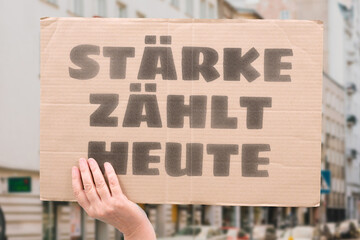 “Stärke Zählt Heute” In uncertain times, only strength matters. STRENGTH. TODAY. POWER. DEFENSE. CRISIS. SECURITY.