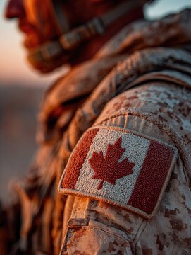 Close up of a Canadian flag patch on a soldier s uniform. Symbol of patriotism, service, and national pride. Ideal for Remembrance Day, Veterans, or Canada Day themes