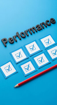 Performance review checklist with checkmarks and pencil on blue background