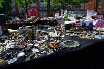 Old vintage things on the street flea market on Place du Jeu de Balle, Marolles district of Brussels, Belgium