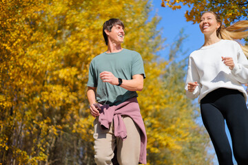 Full body profile couple young two friends strong athletic sportswoman athlete woman man