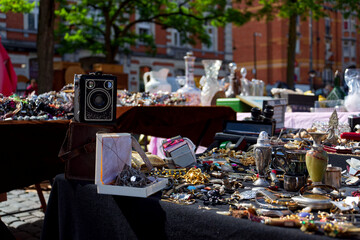 Old vintage things on the street flea market on Place du Jeu de Balle, Marolles district of Brussels, Belgium