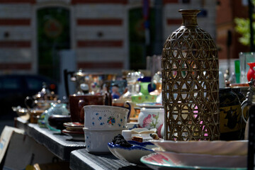 Old vintage things on the street flea market on Place du Jeu de Balle, Marolles district of Brussels, Belgium