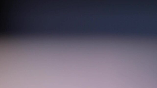 Abstract Fading Light Leak Gradient Moving Up and Down