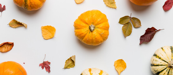 Autumn composition. Pattern made of dried leaves and other design accessories on table. Flat lay, top view