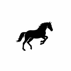 Obraz premium Silhouette of a powerful black horse in mid-gallop, dynamic pose.