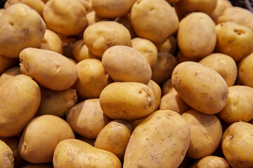 Raw potatoes on the market