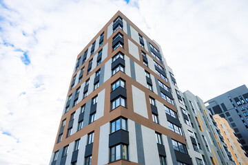 Fototapeta premium A modern residential complex: monolithic buildings, comfort class, developed infrastructure, proximity to nature, cozy courtyards, playgrounds.