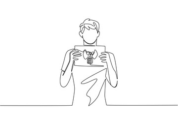Continuous one line drawing a man in casual clothes holds a paper with a mockup of a thyroid gland with both hands. Therapy. Sickness. World Thyroid Day. Single line draw design vector illustration