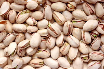 Pistachio detail cut. Top view, texture, repeating pattern.