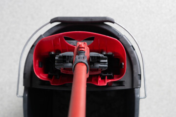Vacuum cleaner in action showcasing its design and functionality on a clean floor