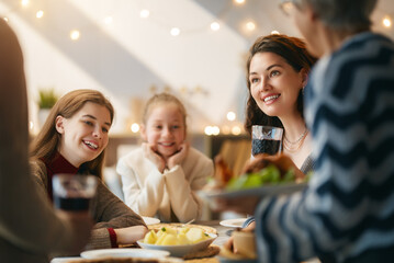 Family celebrating Thanksgiving Day