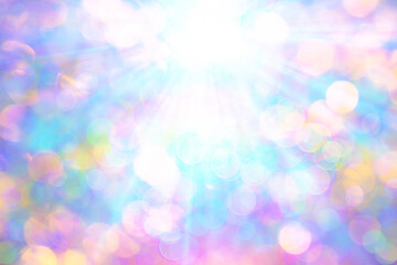 ボケたカラフルなバックグラウンドに光