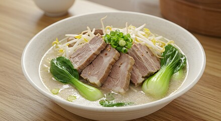 Delicious Bowl of Pork Belly Ramen Soup with Bok Choy, Bean Sprouts and Green Onion  Japanese Noodle Dish
