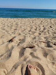 feet on the beach