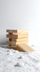Stacked light-colored wooden blocks