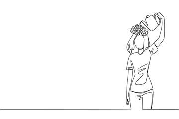 Continuous one line drawing a woman watering flowering plants above head. Symbolism clears the mind. Come with good thoughts. National Water a Flower Day. Single line draw design vector illustration