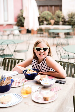 Girl on vacation in Italy at cafe