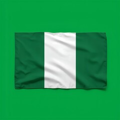 Obraz premium Nigerian flag waving proudly against a vibrant green backdrop representing the nation's spirit and identity