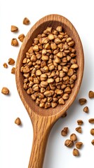 Top-down view of grains in a wooden spoon