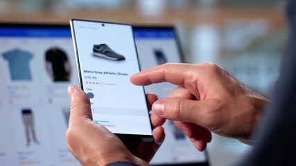 Man Holding Smartphone Adding Shoes - Powered by Adobe