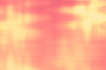 Wide golden flare spreading over coral haze, with silky motion blur and atmospheric softness.