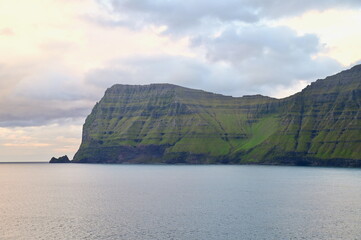 View of Rugged Coastal Cliffs During Sunset from Kalsoy Island, Faroe Islands Wilderness