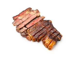Pieces of delicious grilled beef steak isolated on white