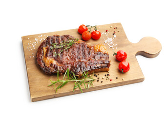 Delicious grilled beef steak with herbs, spices and tomatoes isolated on white
