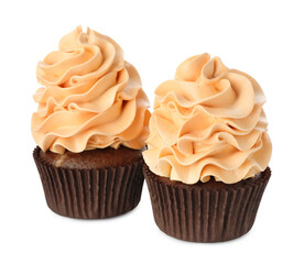 Delicious cupcakes with color cream isolated on white