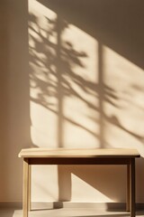 Table with sunlight casting shadows on the wall