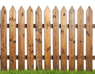 Wooden picket fence with green grass isolated on a white background