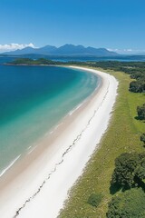 Aerial view white beach, turquoise sea, green coast, blue sky