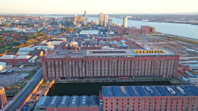 Drone footage of the surrounding neighbourhood and housing near Everton FC&rsquo;s Bramley-Moore Dock stadium in Liverpool. Captured at sunset, this video highlights the residential streets, docklands.
