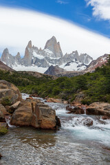 Fitz Roy mountain and river near El Chalten, in the Southern Patagonia, view of landscape on the hike with impressive cloud