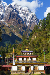 Monastery Nestled Beneath Majestic Snowcapped
