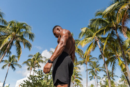 Muscular african american man enjoys a sunny workout session in miami
