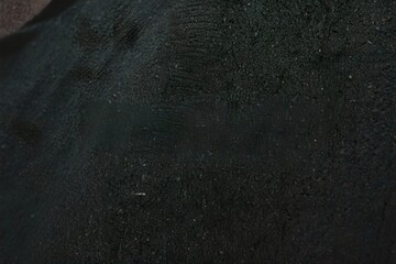 Dark Textured Surface With Tiny Glittering Particles