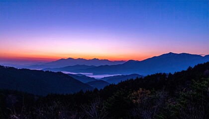 Mountain range bathed in twilight hues
