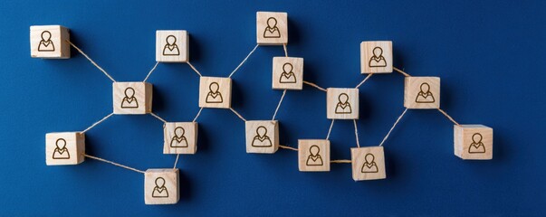 wooden blocks connected by lines with human icons