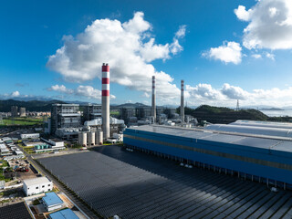 Fototapeta premium aerial view power station under blue sky
