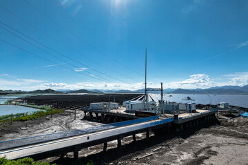 Naklejka premium aerial view solar power station on beach